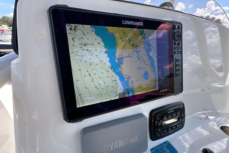 Slide: The Image of Lowrance navigation system on 2020 NauticStar 2302 Legacy boat dashboard. - 33
