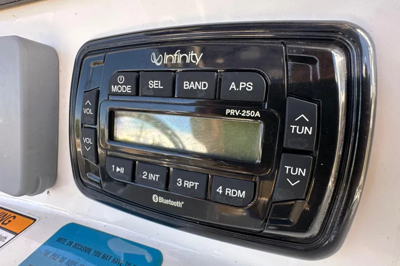 Slide: The Image of Infinity PRV-250A marine stereo on 2020 NauticStar 2302 Legacy boat dashboard. - 35