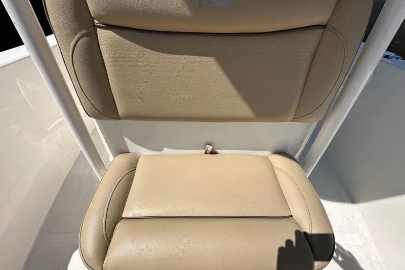 Slide: The Image of Beige seating on 2020 NauticStar 2302 Legacy boat, showcasing comfort and design. - 71