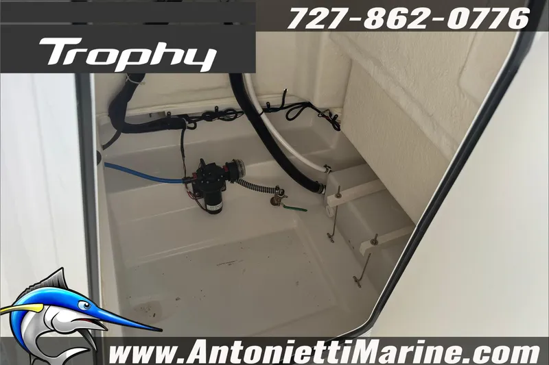 Slide: The Image of 2026 Trophy T20CC Center Console interior with wiring and components, Antonietti Marine branding. - 23