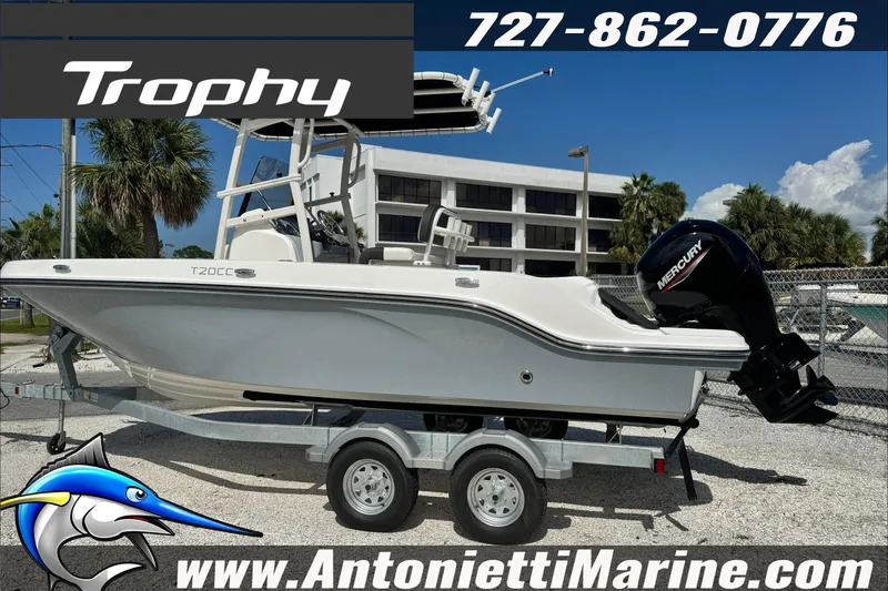 Slide: The Image of 2026 Trophy T20CC Center Console boat on trailer, displayed outdoors at Antonietti Marine. - 6