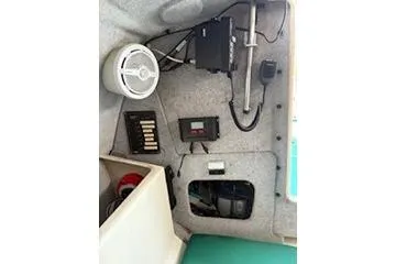 Slide: The Image of Interior view of 2003 Corsair F-24MKII sailboat showing electronic equipment and speaker. - 8