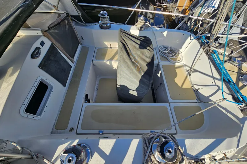 Slide: The Image of Cockpit of 1979 Fast Passage 39 sailboat with winches and seating. - 6