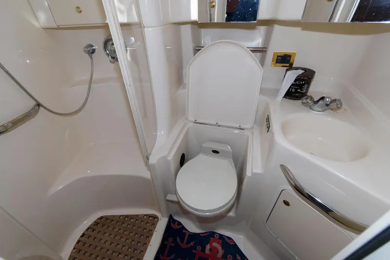Slide: The Image of Bathroom interior of 2000 Sea Ray 380 Sundancer yacht with shower and sink. - 15