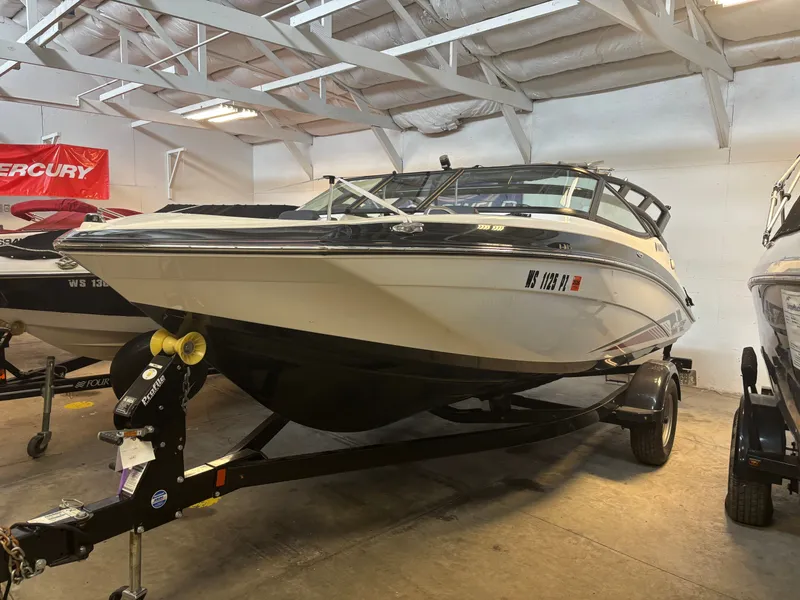 Slide: The Image of 2017 Yamaha Boats RP1800A SAP19 in a storage facility. - 2