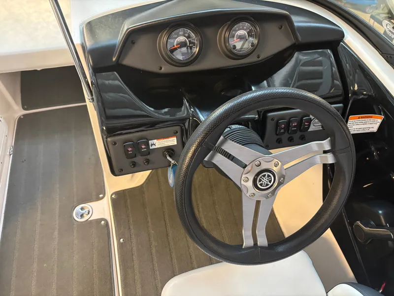 Slide: The Image of Yamaha Boats RP1800A SAP19 2017 dashboard with steering wheel and gauges. - 4