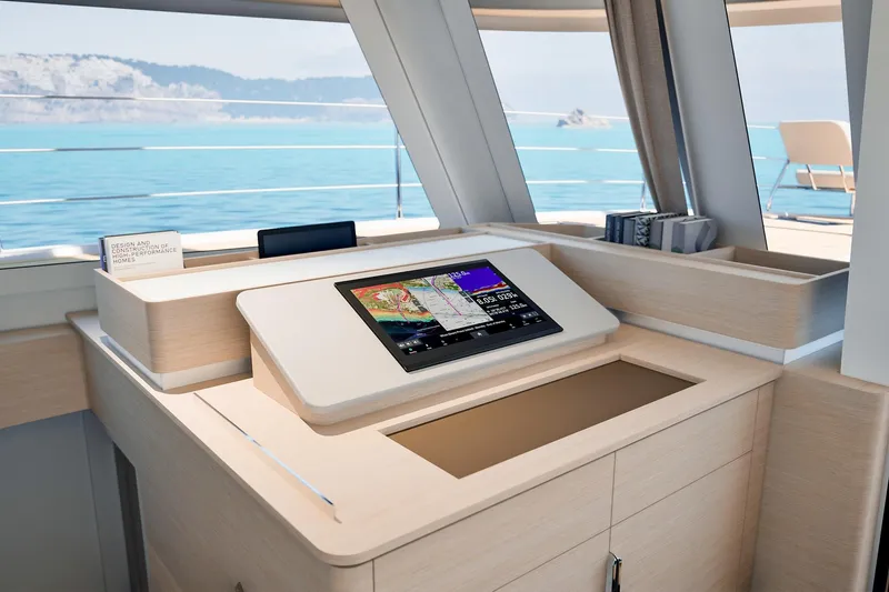 Slide: The Image of Modern navigation station on 2026 Fountaine Pajot 55 yacht with ocean view. - 32