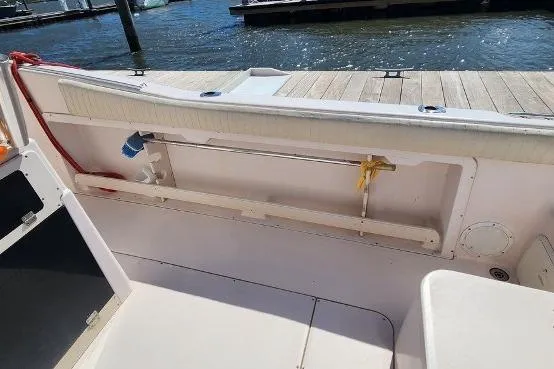 Slide: The Image of 1999 Grady-White Advance 247 boat interior with dockside view. - 19