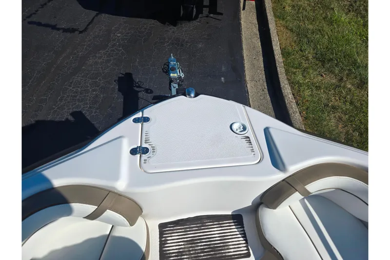 Slide: The Image of Bow view of 2013 Yamaha Boats 242 Limited S on trailer. - 19