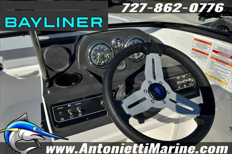 Slide: The Image of 2026 Bayliner VR4 Bowrider OB dashboard with steering wheel and gauges, Antonietti Marine branding. - 15