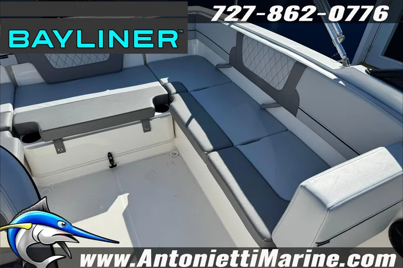Slide: The Image of 2026 Bayliner VR4 Bowrider OB interior seating, featuring gray upholstery and modern design. - 25