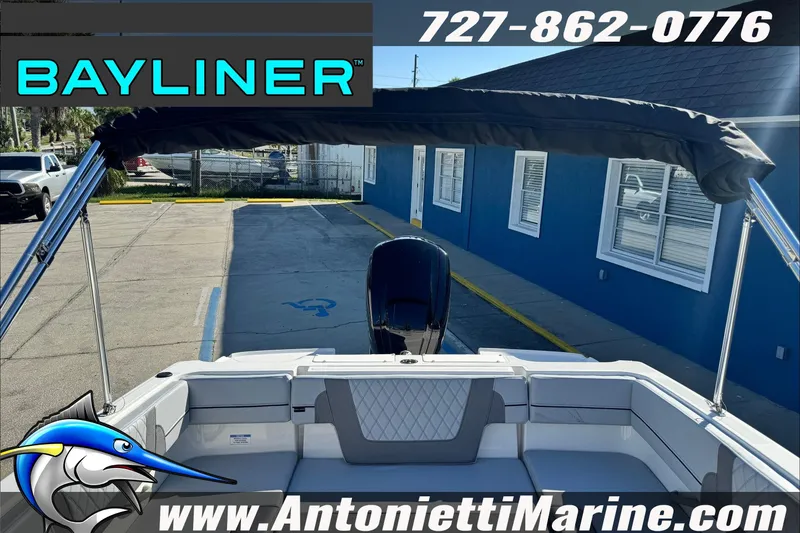 Slide: The Image of 2026 Bayliner VR4 Bowrider OB with canopy, displayed at Antonietti Marine dealership. - 27