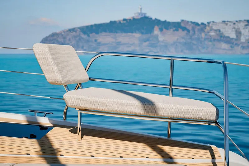 Slide: The Image of Luxury seating on 2026 Fountaine Pajot 55 yacht, with scenic ocean view. - 6