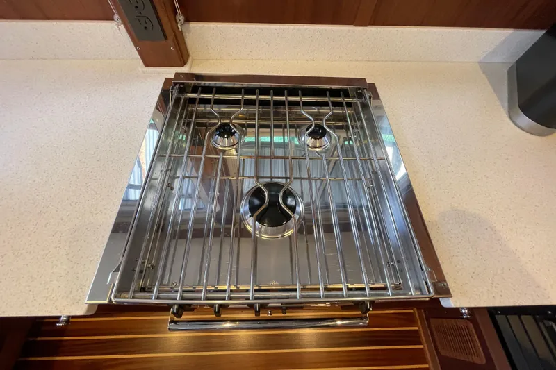 Slide: The Image of Stainless steel stove on 2021 American Tug 362 yacht kitchen countertop. - 12