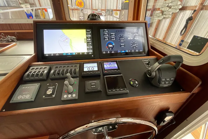 Slide: The Image of Pilothouse of 2021 American Tug 362 with advanced navigation and control systems. - 23