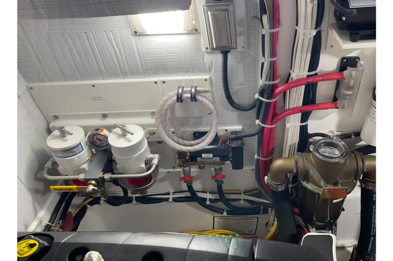 Slide: The Image of Engine room of 2021 American Tug 362 with fuel filters and wiring. - 35