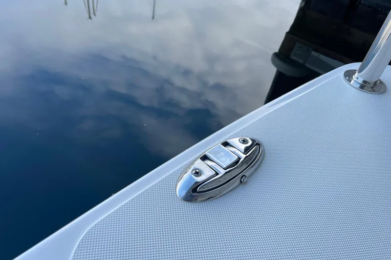 Slide: The Image of Close-up of 2021 American Tug 362 boat deck with chrome hardware. - 62