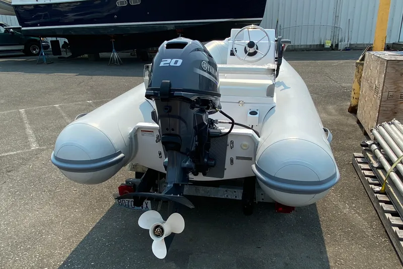 Slide: The Image of Rear view of a 2021 American Tug 362 with Yamaha outboard motor. - 67