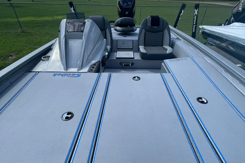 Slide: The Image of 2026 Xpress H20 Bass boat interior with SeaDek flooring and seating. - 5