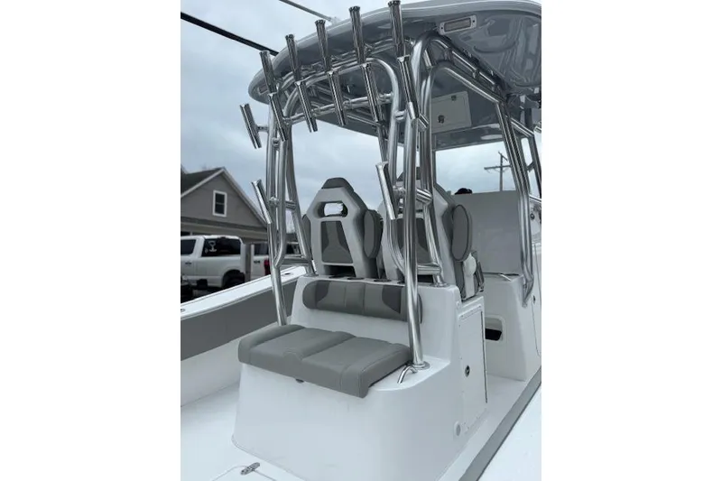 Slide: The Image of 2026 Cape Horn 31 T boat interior with sleek seating and rod holders. - 4