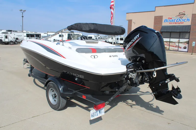 Slide: The Image of 2023 Tahoe T16 boat with Mercury engine on trailer at dealership. - 7