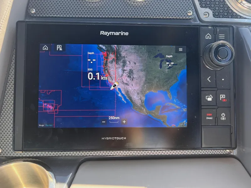 Slide: The Image of Raymarine navigation display on 2019 Cruisers Yachts 338 IO, showing map and speed. - 12