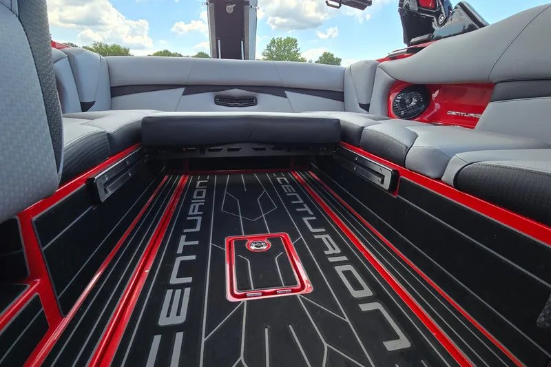 Slide: The Image of 2022 Centurion Fi23 boat interior with sleek seating and stylish flooring design. - 17