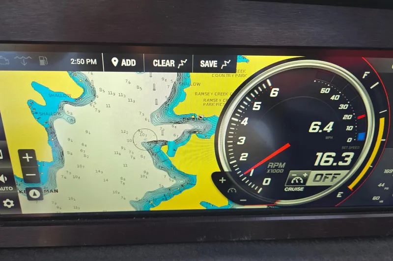 Slide: The Image of Dashboard of a 2022 Centurion Fi23 boat showing navigation map and speedometer. - 23