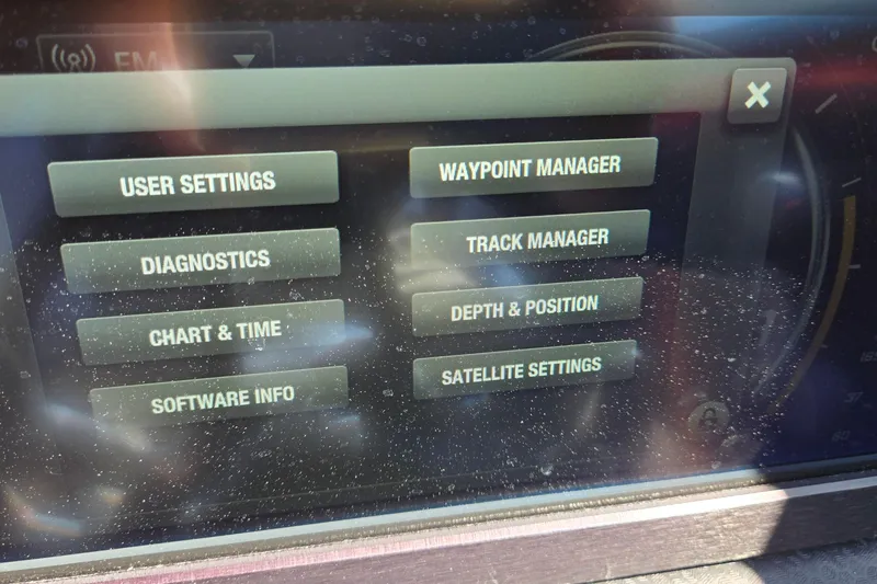 Slide: The Image of Touchscreen display of a 2022 Centurion Fi23 boat showing various settings options. - 25