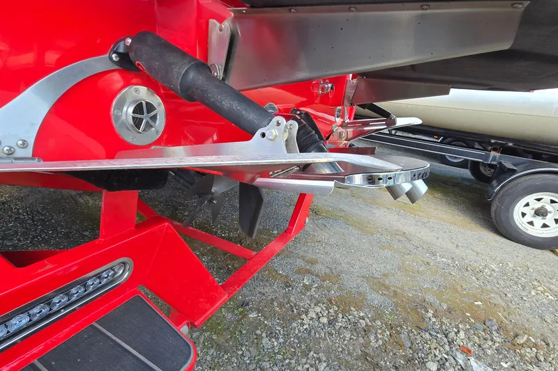 Slide: The Image of 2022 Centurion Fi23 boat rear view showing propeller and exhaust system. - 36