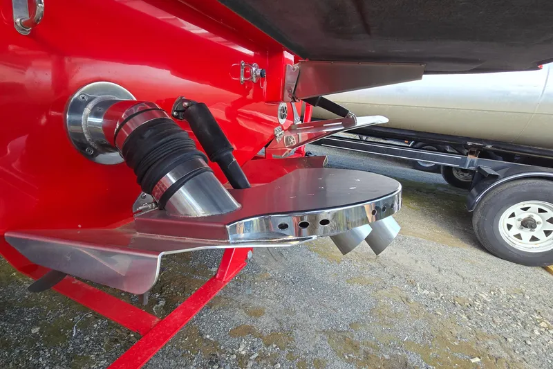 Slide: The Image of 2022 Centurion Fi23 boat propeller and exhaust system, close-up view. - 37