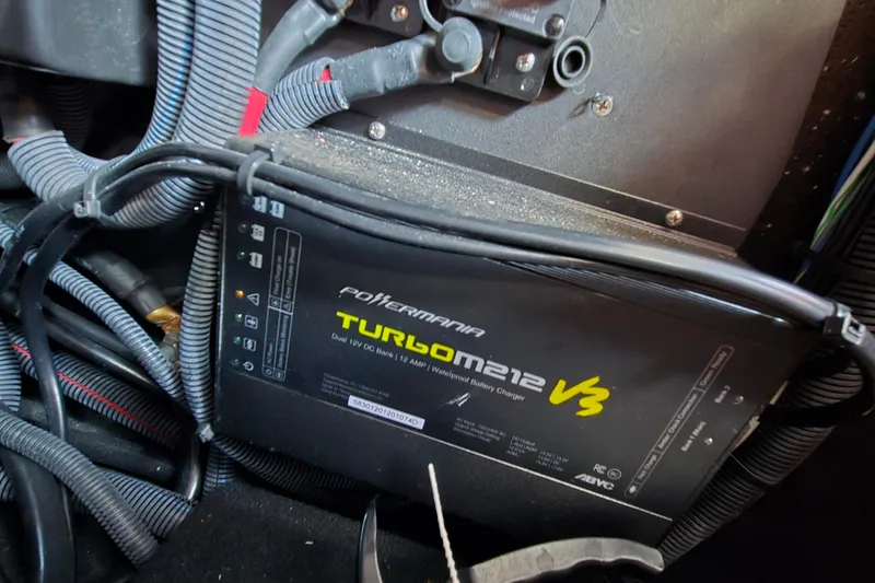 Slide: The Image of 2022 Centurion Fi23 boat with PowerMania Turbo M212 V3 battery charger. - 76