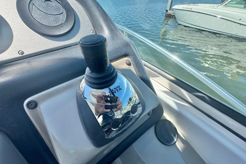 Slide: The Image of Joystick control on 2008 Cruisers 420 boat, featuring Volvo Penta system. - 13