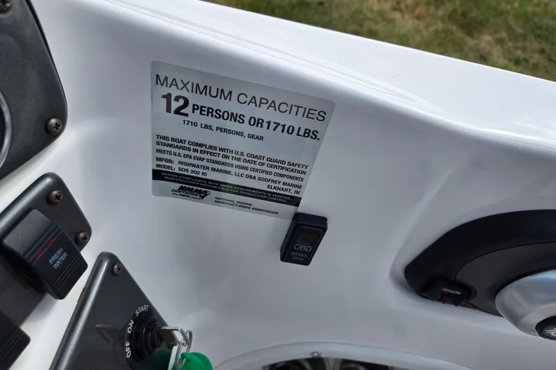 Slide: The Image of 2020 Hurricane SunDeck Sport 202 IO capacity label, maximum 12 persons or 1710 lbs. - 15