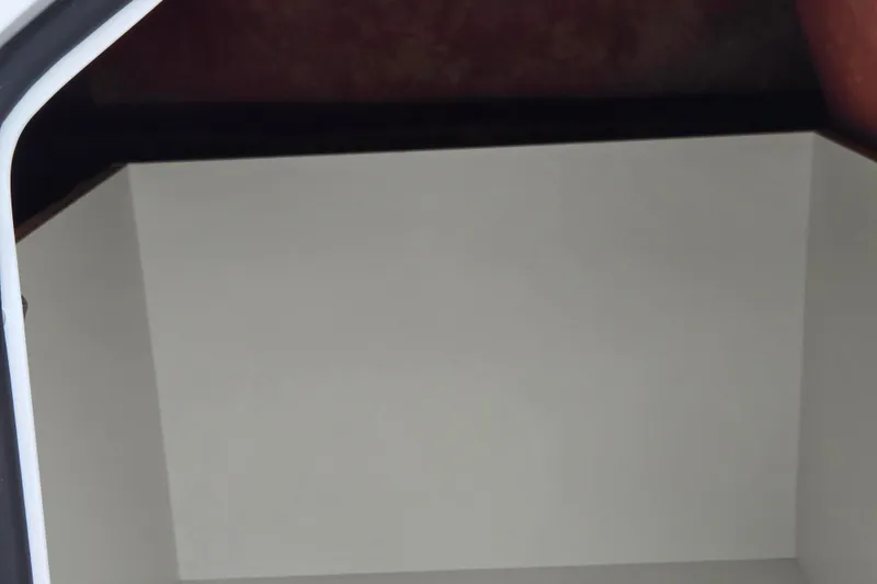 Slide: The Image of Storage compartment of 2020 Hurricane SunDeck Sport 202 IO boat. - 17