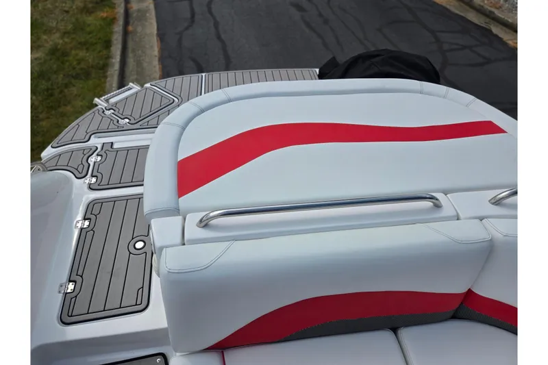 Slide: The Image of 2020 Hurricane SunDeck Sport 202 IO boat with red and white seating, gray deck. - 26