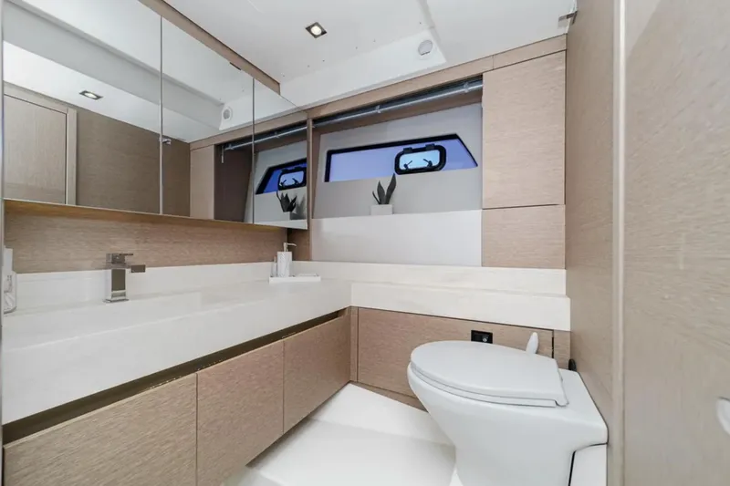 Slide: The Image of Luxurious bathroom in 2019 Prestige 520 yacht with modern fixtures and sleek design. - 19
