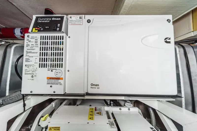 Slide: The Image of Cummins Onan marine generator in a 2019 Prestige 520 yacht engine room. - 41