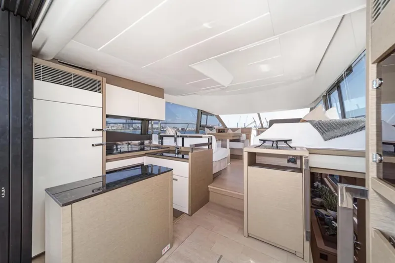 Slide: The Image of Luxurious interior of a 2019 Prestige 520 yacht with modern design and spacious layout. - 7