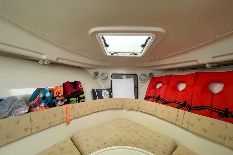 Slide: The Image of Interior of 2007 Wellcraft 252 Coastal boat with life jackets and seating area. - 11