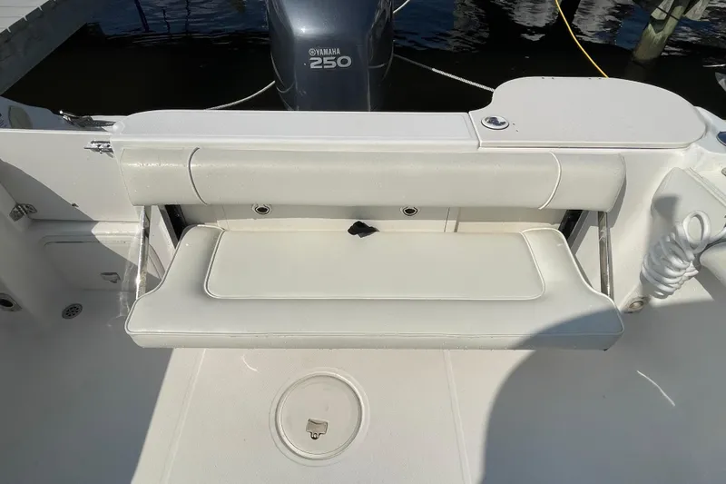 Slide: The Image of 2007 Wellcraft 252 Coastal boat with Yamaha 250 engine, featuring a foldable seat. - 30