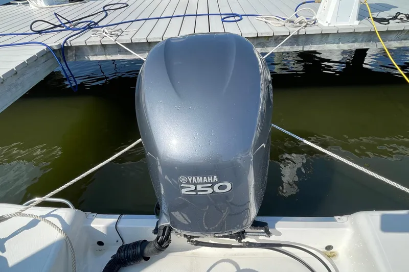 Slide: The Image of Yamaha 250 outboard motor on 2007 Wellcraft 252 Coastal boat at dock. - 37
