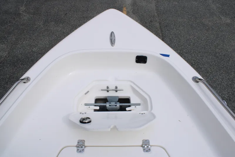 Slide: The Image of Bow view of 2026 Key West 1720 Center Console boat, featuring anchor storage. - 16