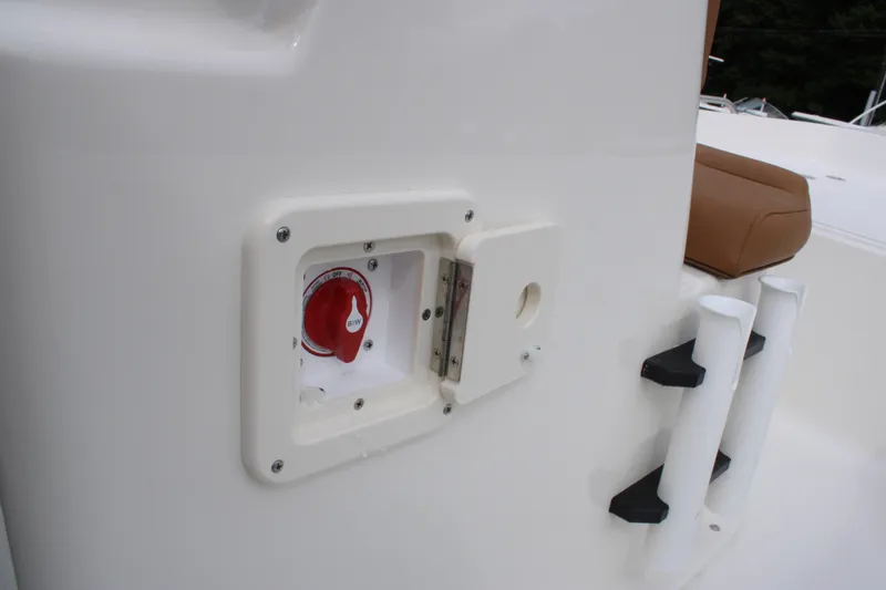 Slide: The Image of 2026 Key West 1720 Center Console boat with battery switch and rod holders. - 23