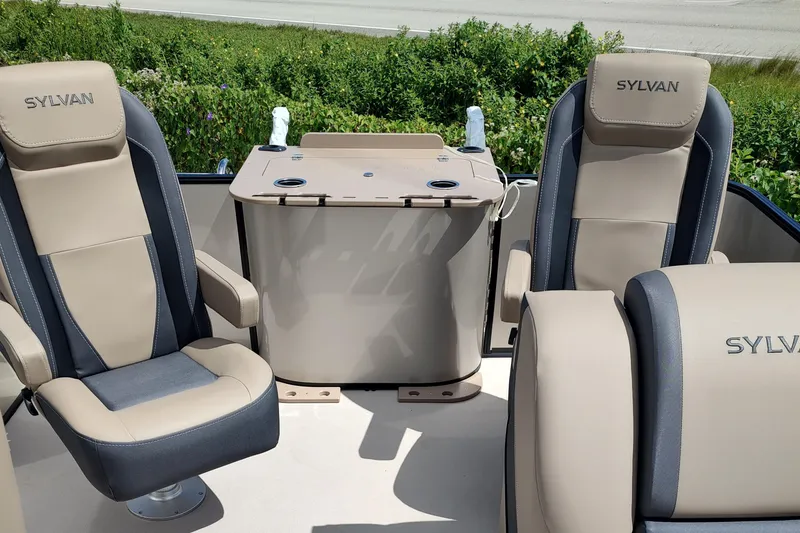 Slide: The Image of 2026 Sylvan Mirage X3 Party Fish pontoon boat on trailer, Salty Dog Marine, Grant, FL. - 11