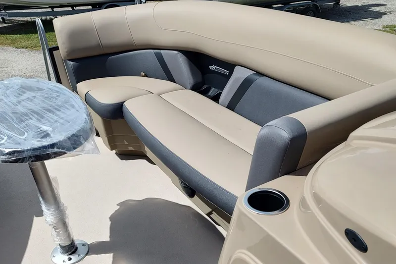 Slide: The Image of Steering wheel of 2026 Sylvan Mirage X3 Party Fish boat with dashboard controls. - 15