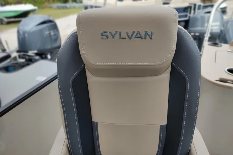Slide: The Image of 2026 Sylvan Mirage X3 Party Fish boat seat with logo, showcasing luxury design. - 22