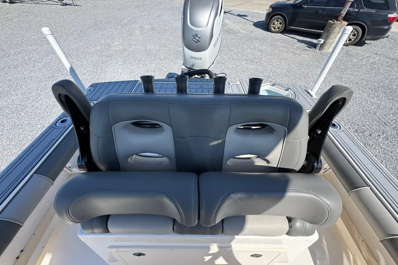 Slide: The Image of 2022 Sea Born FX25 Bay boat with gray seating and Suzuki 350 engine. - 27