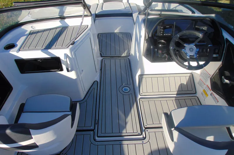 Slide: The Image of 2026 Yamaha Boats 195S interior with sleek design and modern dashboard features. - 18