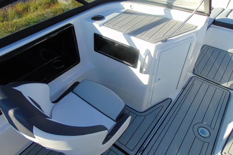 Slide: The Image of 2026 Yamaha Boats 195S interior with seating and storage compartments. - 20